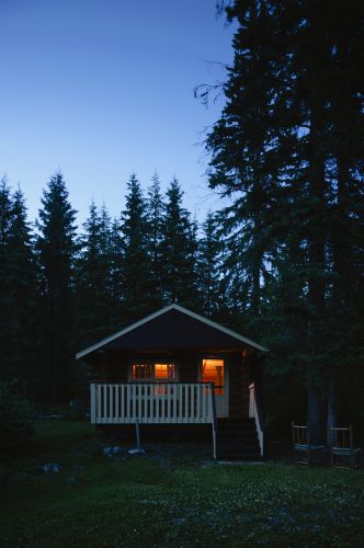 Peaceful Cove Cabin at night